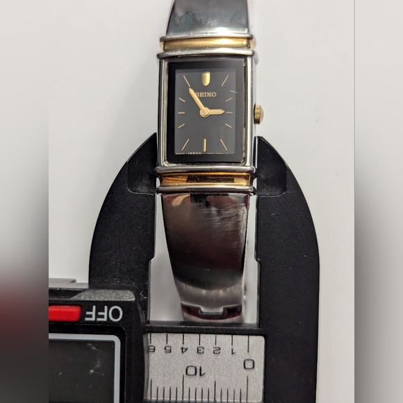 Seiko Gold-Tone Steel Bangle Jewelry Clasp Brown Dial Quartz Ladies Watch SUJG12